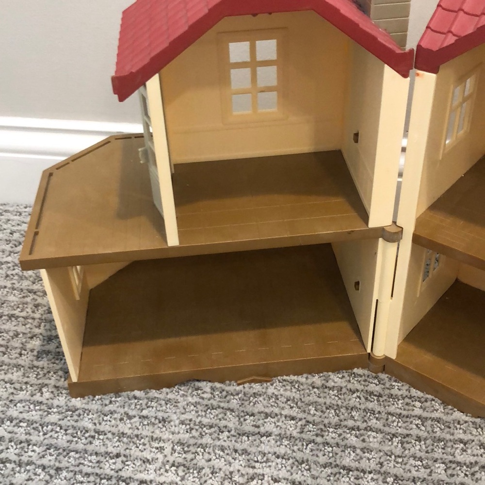 House for any small dolls does not include anything but the house